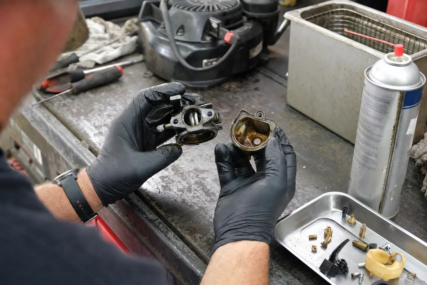 Gummed up carburetor from ethanol gas being cleaned at the shop