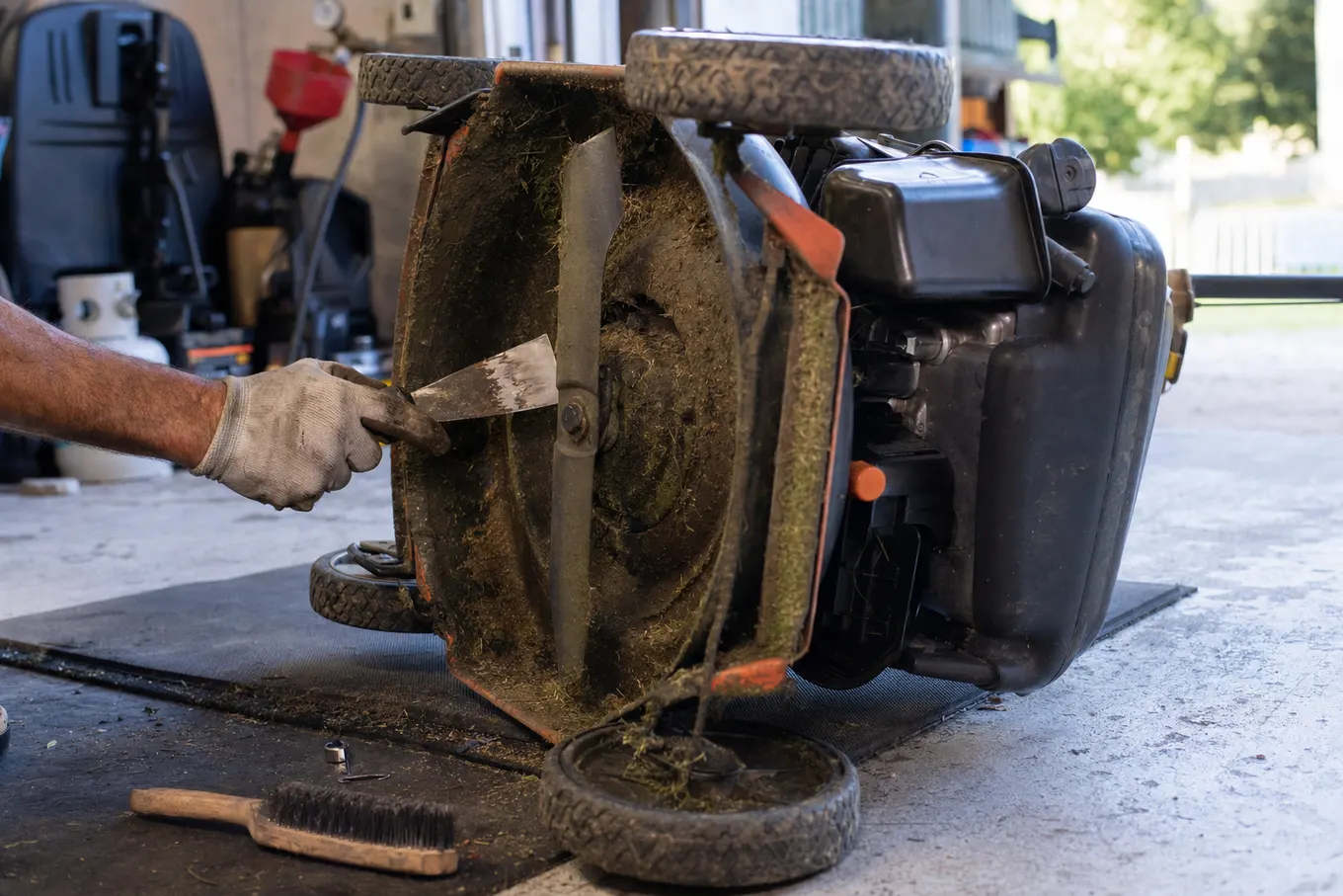 Self propelled push mower being serviced on the bench at Joe's Small Engine Repair in Port Charlotte